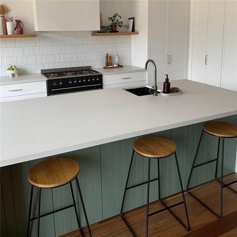A Kitchen With a Stove, Sink, and Stools — Kenross Kitchens In Erina, NSW