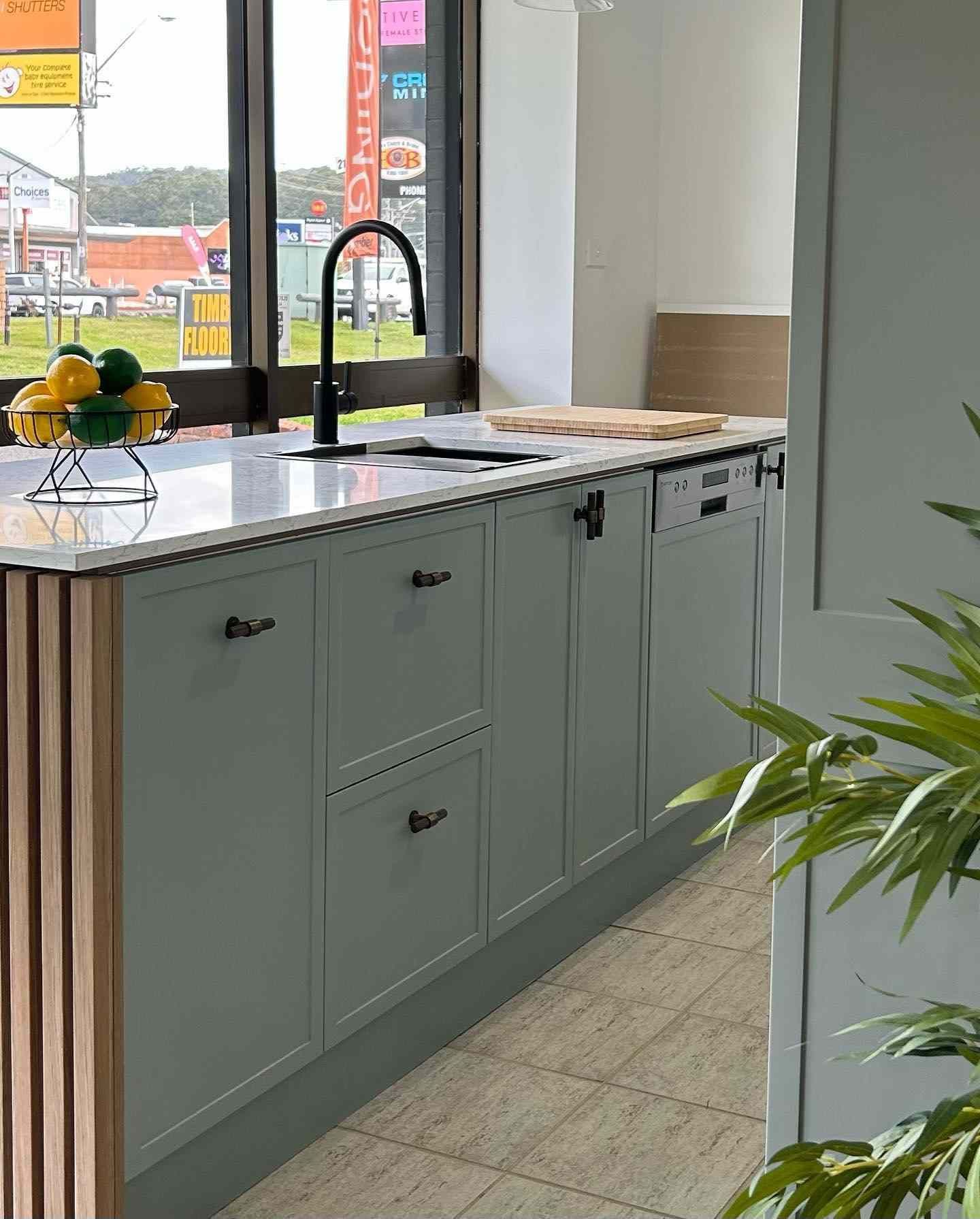 A Kitchen With a Sink and a Bowl of Lemons on the Counter  — Kenross Kitchens In Wyong, NSW
