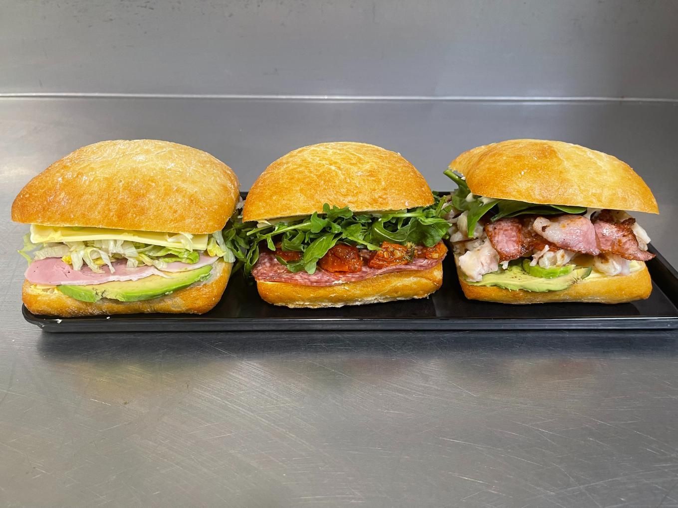 Three Sandwiches Are Sitting On A Tray On A Counter — Geurie General Store In Geurie, NSW