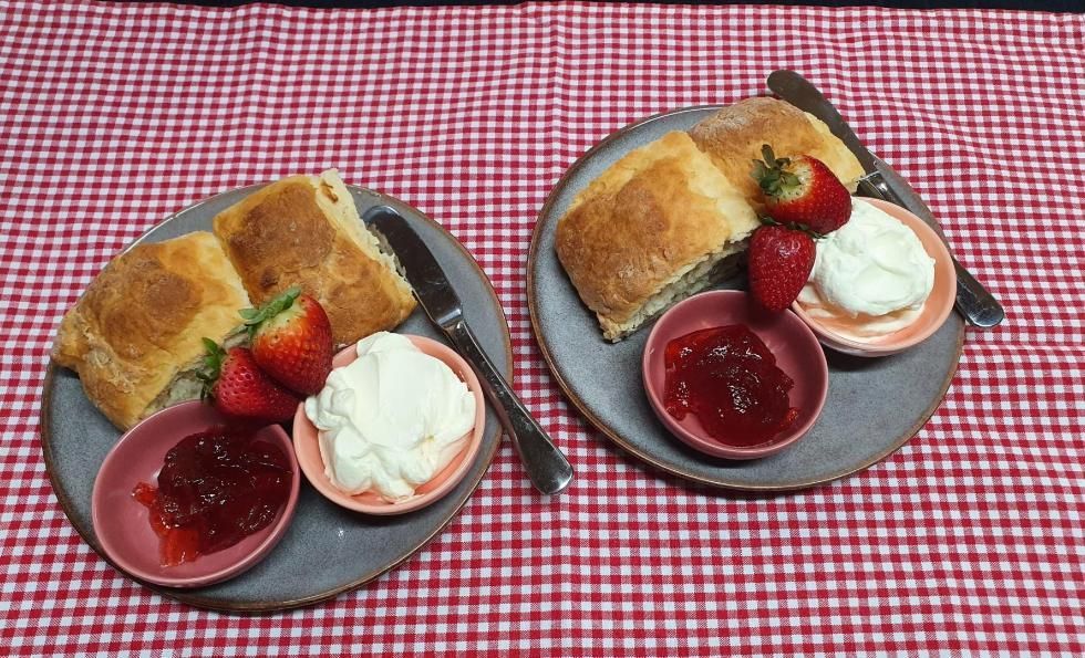 Two Plates Of Food With Strawberries , Jam And Whipped Cream — Geurie General Store In Geurie, NSW