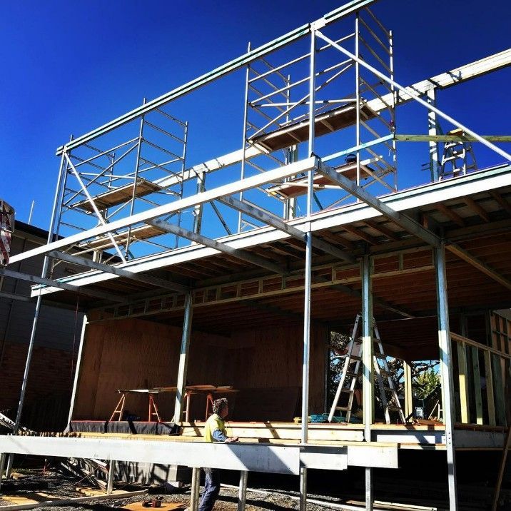 A Building Under Construction With Scaffolding — Barry Smith Engineering Pty Ltd in Coffs Harbour, NSW