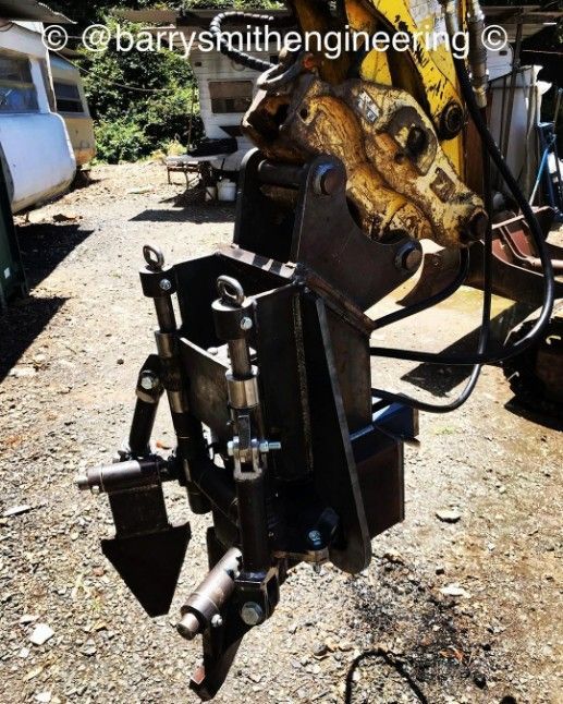 A Piece of Metal is Sitting on the Ground Next to a Truck — Barry Smith Engineering Pty Ltd in Coffs Harbour, NSW
