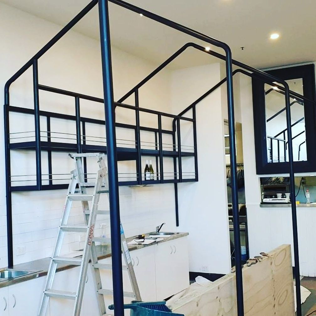 A Kitchen With a Ladder and a Mirror on the Wall — Barry Smith Engineering Pty Ltd in Coffs Harbour, NSW