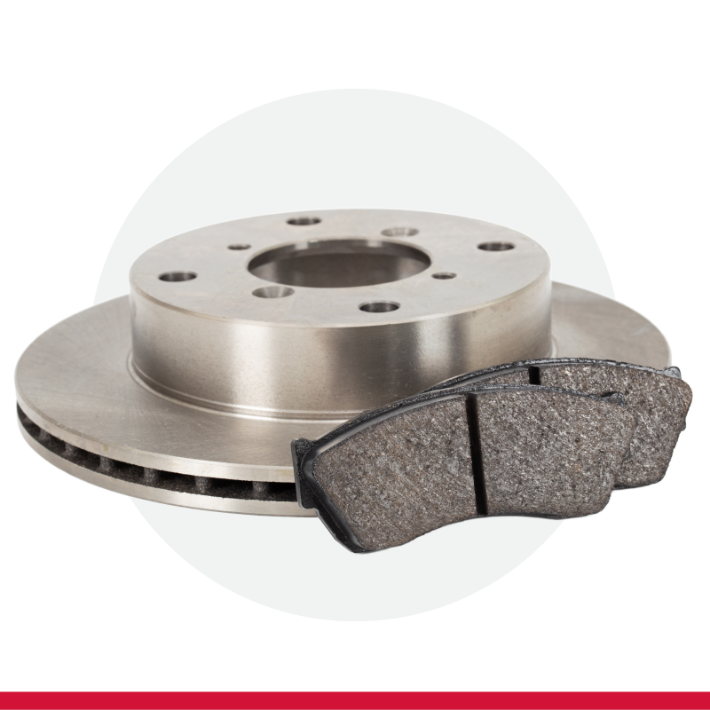A stack of brake pads and rotors on a white background.