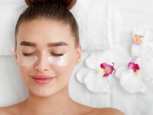 Woman with Patches Under Eyes — Nampa, ID — Nampa Chiropractic & Wellness Clinic