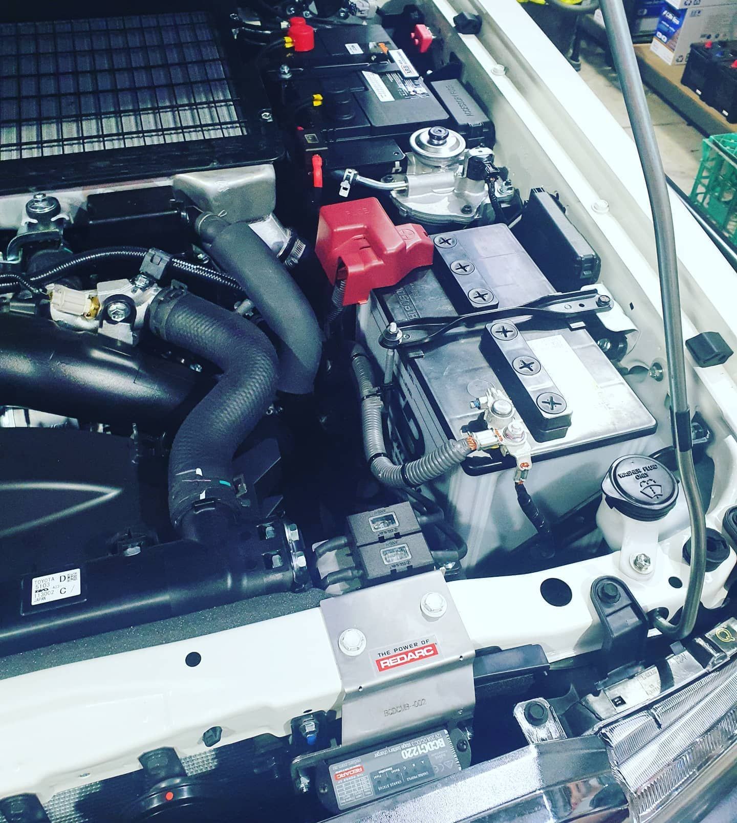 Car Engine Bay, Black and Silver Components — Auto Watt in Kelso, NSW