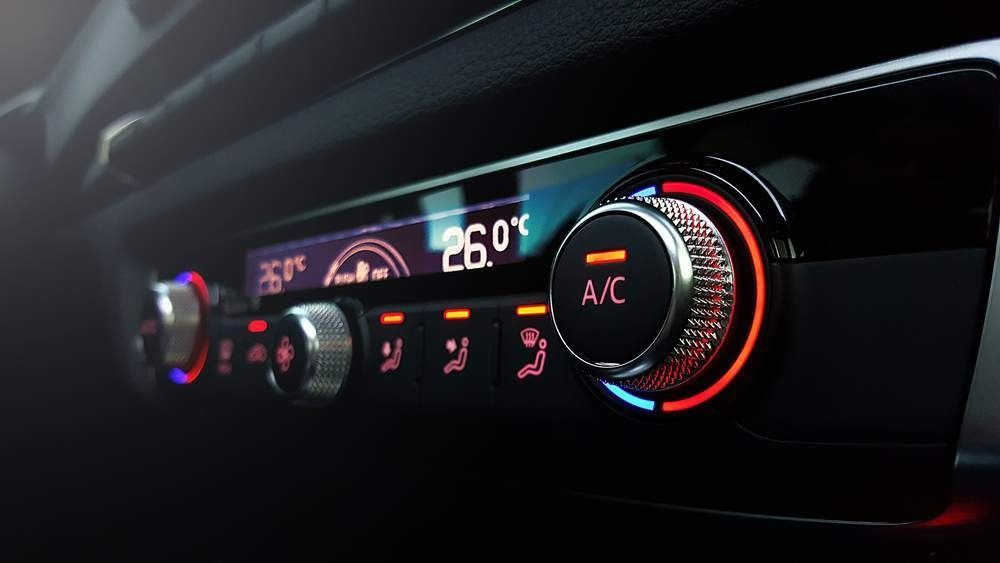 Car's Digital Climate Control Panel With Knobs and Buttons — Auto Watt in Kelso, NSW