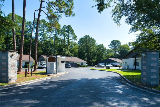 A residential area with a lot of trees and houses.