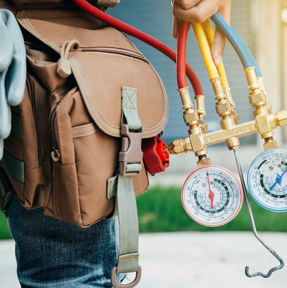 Man holding gauge meter