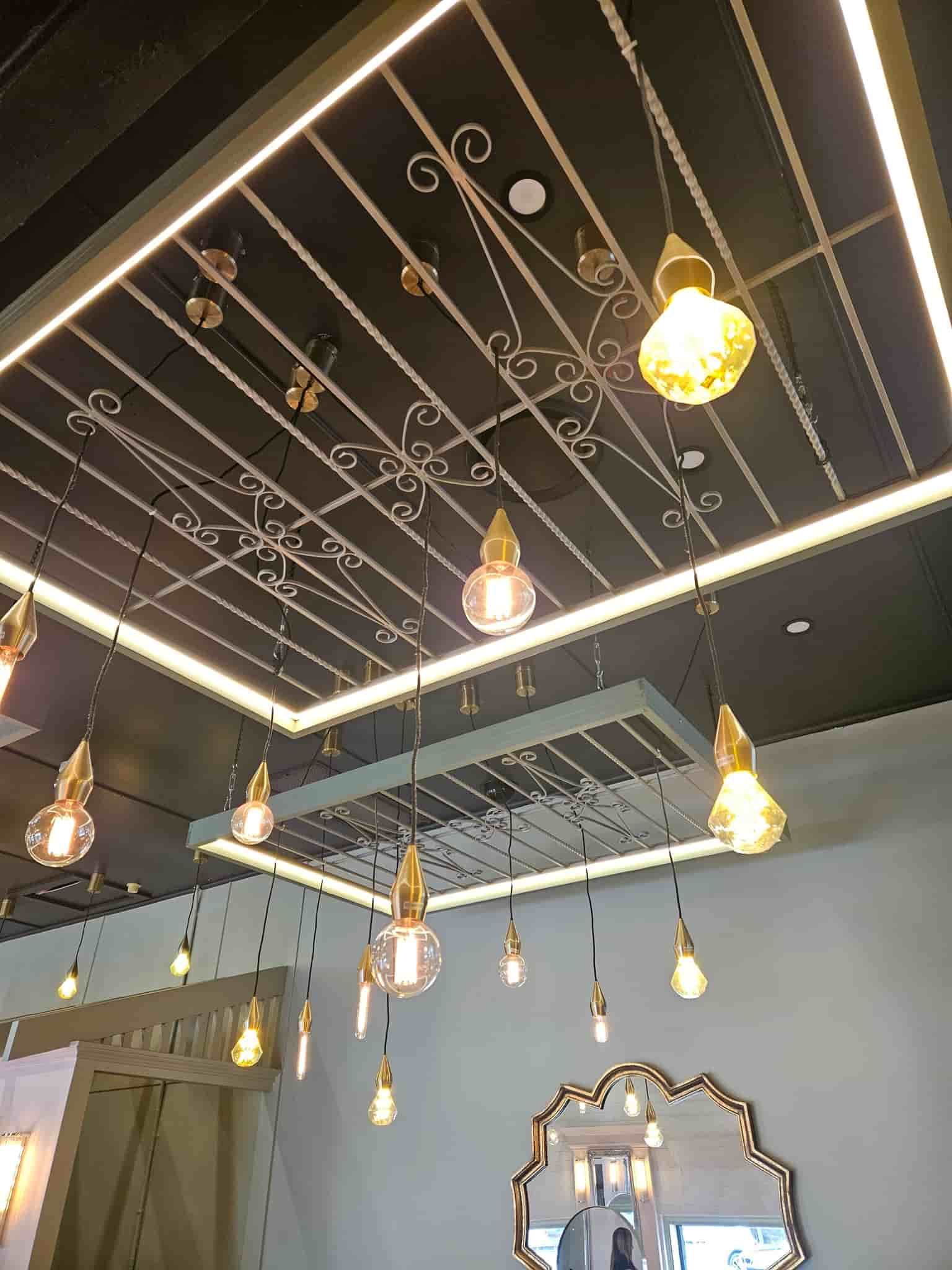 A Ceiling with A Lot of Lights Hanging from It  — KPJ Electrical In Charlestown, NSW