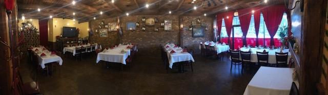 A large dining room filled with tables and chairs.