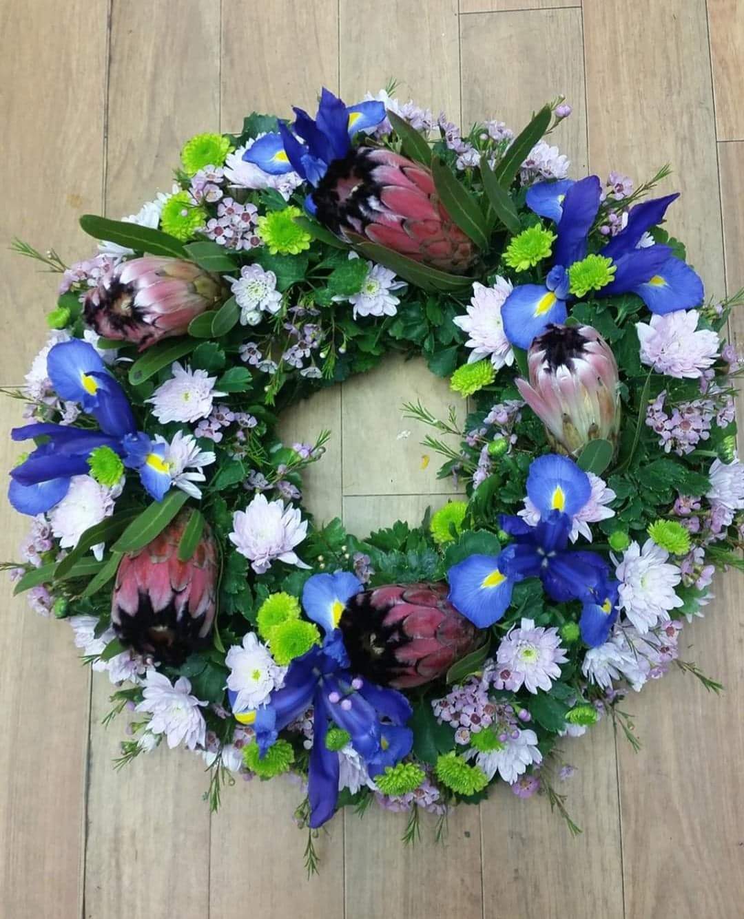 Wreath With Blue And White Flowers— Bouquets in Wanguri, NT