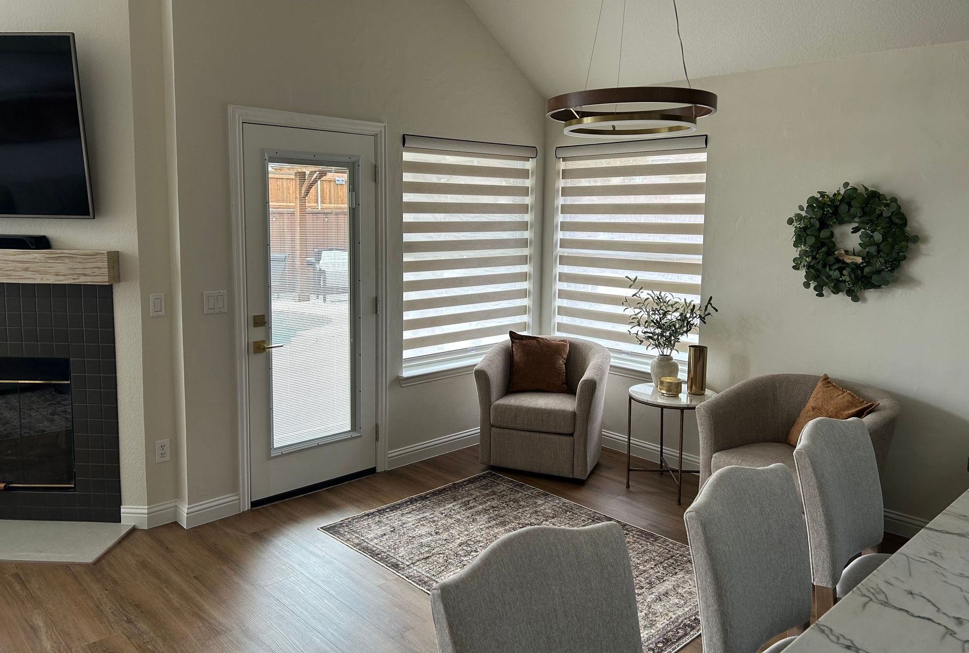 A living room filled with furniture and a fireplace.