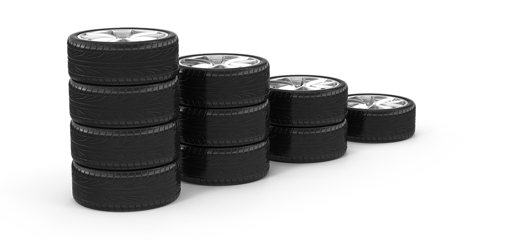 two black tires with silver rims on a white background