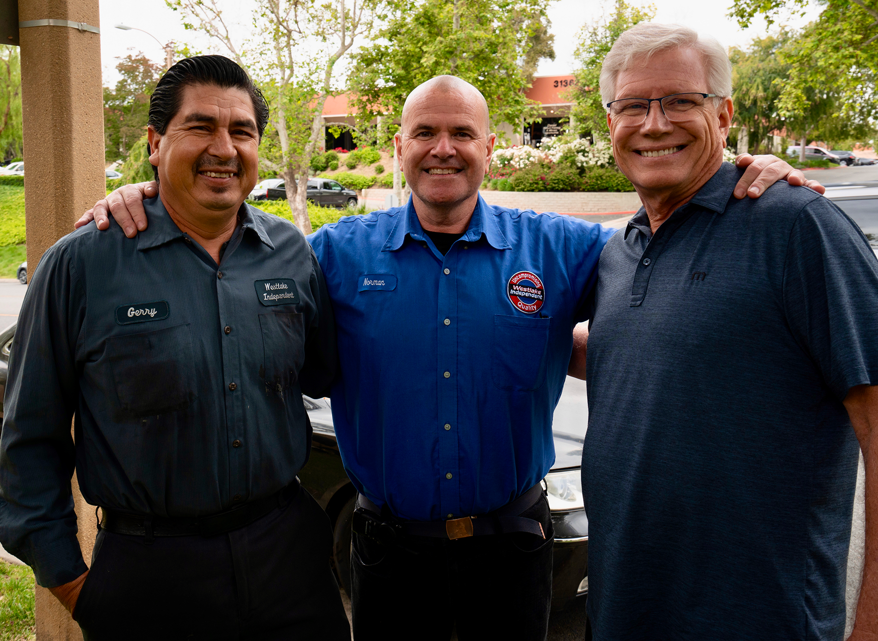 Three people smiling  | Westlake Independent Automotive