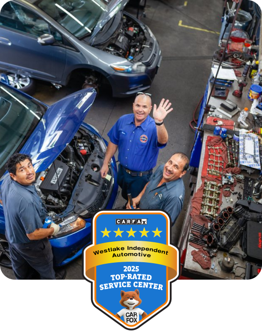 Mechanics smiling and waving. Carfax badge for top-rated service center for 2025. | Westlake Independent Automotive