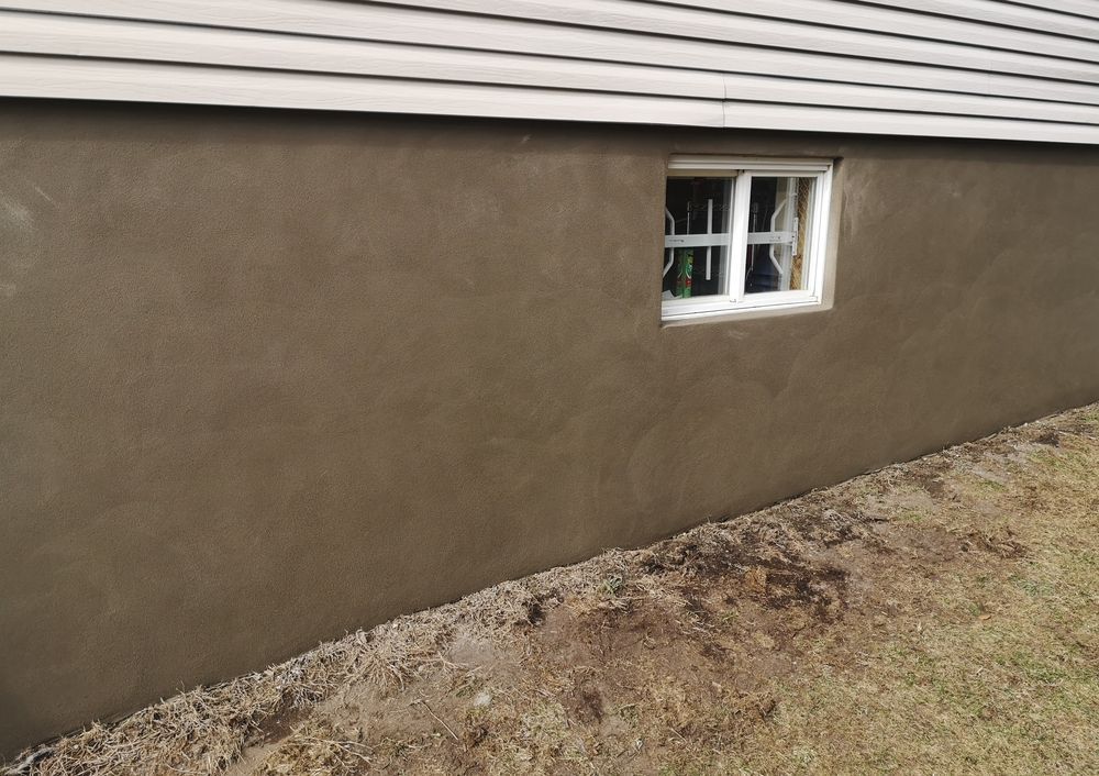 A house with a window on the side of it.