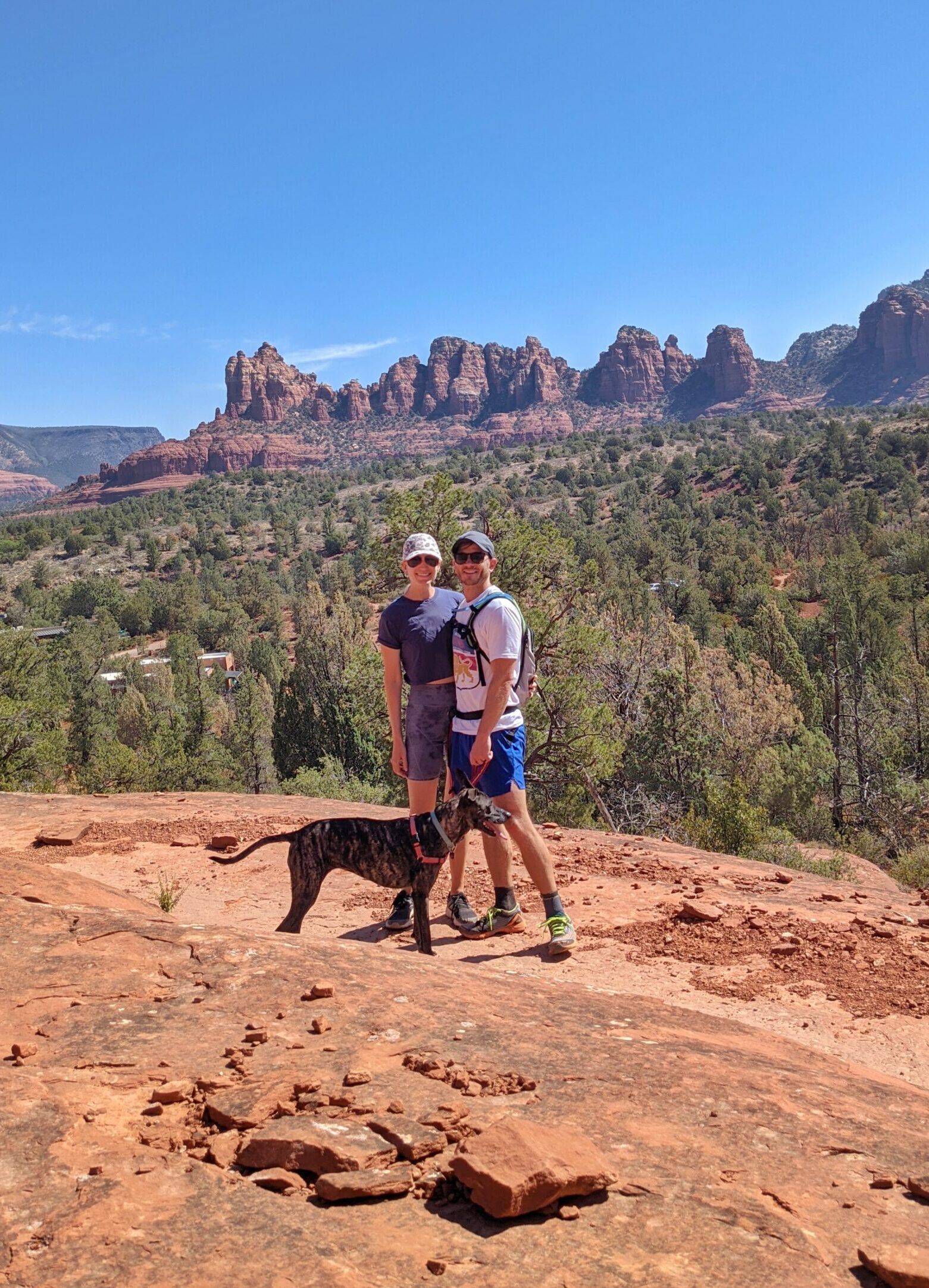 Darcie Brown with her husband and dog hiking in Sedona