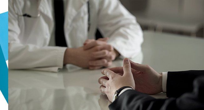 Person in Suit at Urologist Appointment — Hickory, NC — Viewmont Urology Clinic, PA Person in Suit at Urologist Appointment — Hickory, NC — Viewmont Urology Clinic, PA