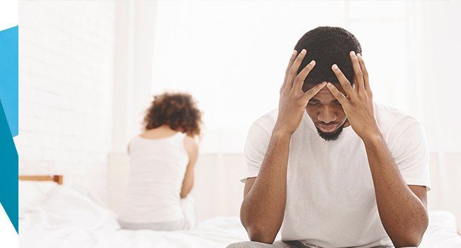 Young Couple in Bed Having Problems — Hickory, NC — Viewmont Urology Clinic, PA Young Couple in Bed Having Problems — Hickory, NC — Viewmont Urology Clinic, PA