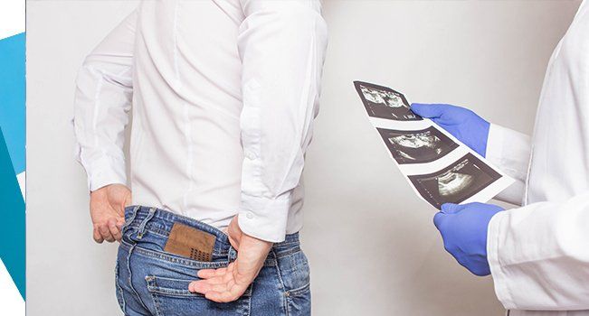 Urologist Holds a Picture of an Ultrasound Examination — Hickory, NC — Viewmont Urology Clinic, PA Urologist Holds a Picture of an Ultrasound Examination — Hickory, NC — Viewmont Urology Clinic, PA