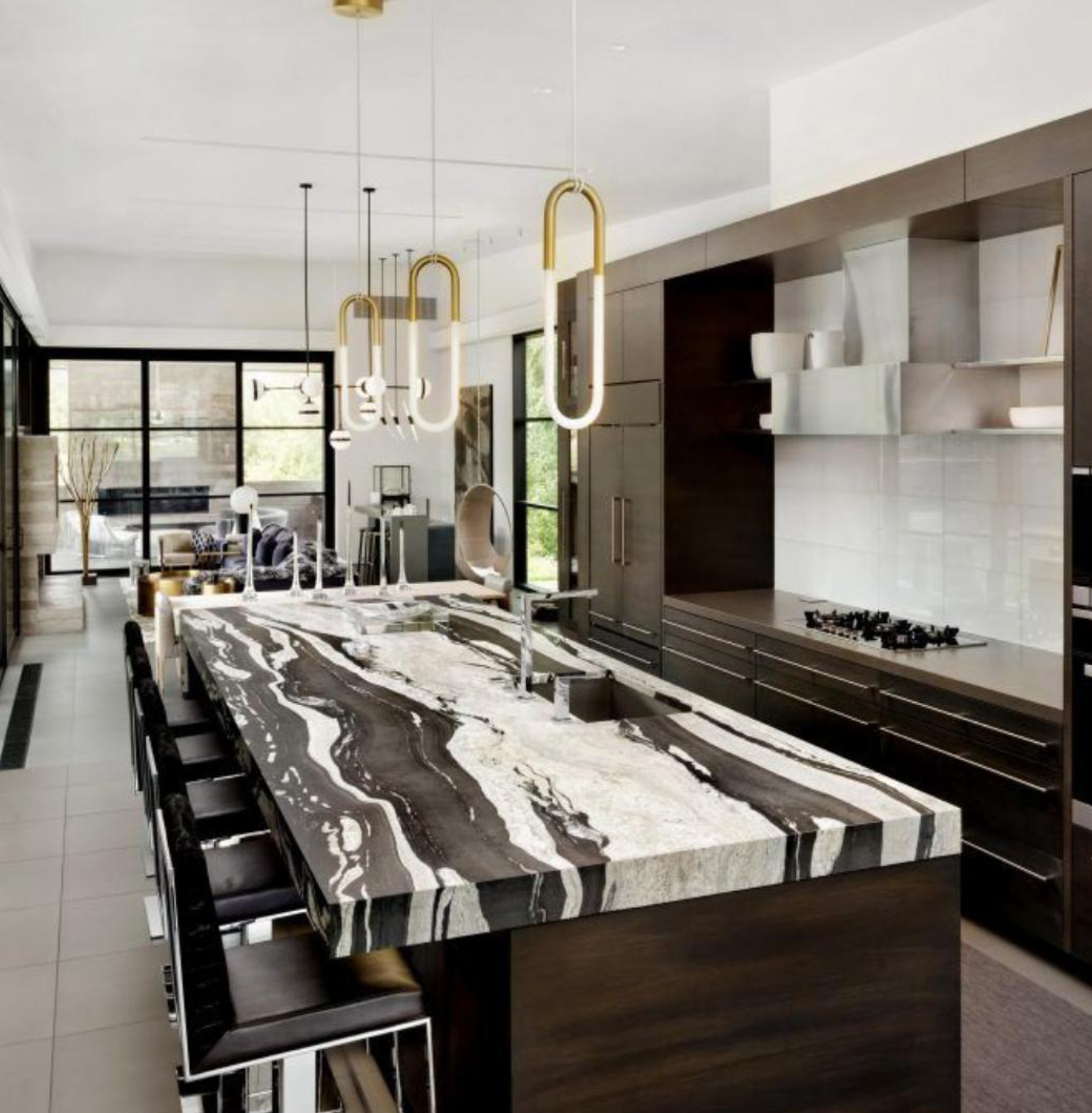 A kitchen with a large black and white counter top