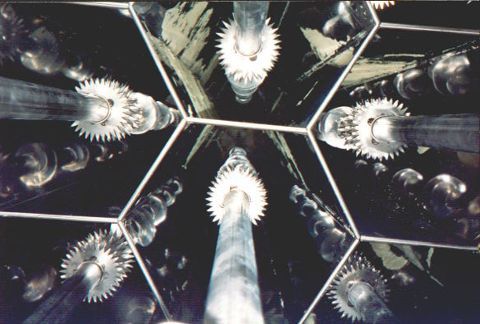 Looking up at a kaleidoscope with a tower in the middle