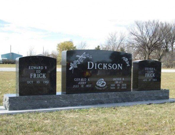 Triple family memorial in black granite all placed on one base