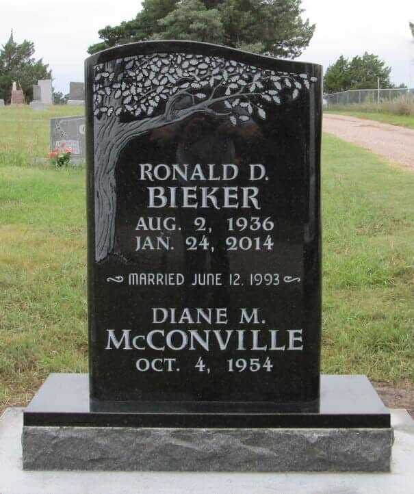 Companion vertical monument in black granite with sandblasted tree design