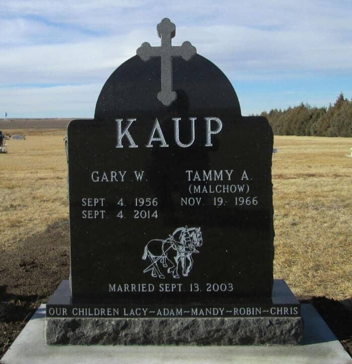 Companion vertical monument in gold star granite