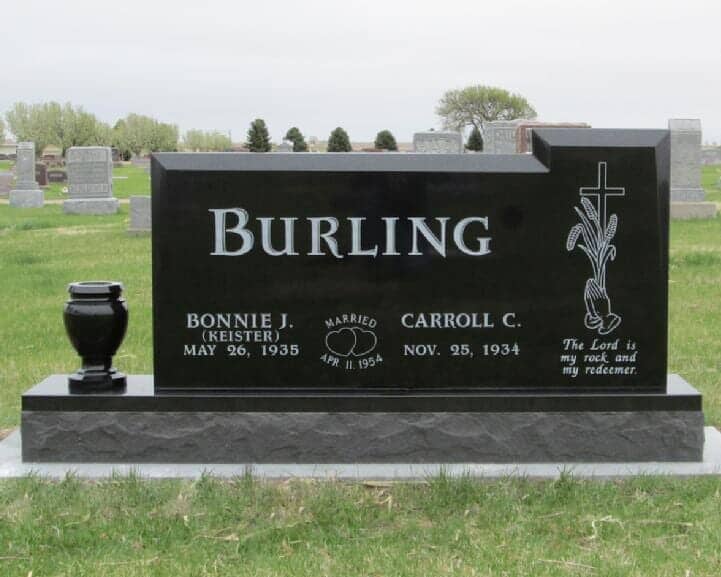 Companion monument in black granite with polished bevels and hand etchings