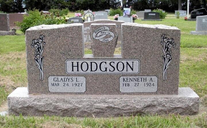 Companion monument in rose granite with cut away area for matching tapered vase