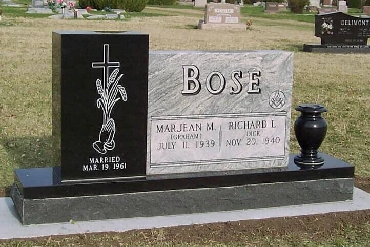 Companion monument in gray cloud granite with black pillar