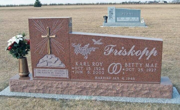 Companion monument in red granite accented with bronze
