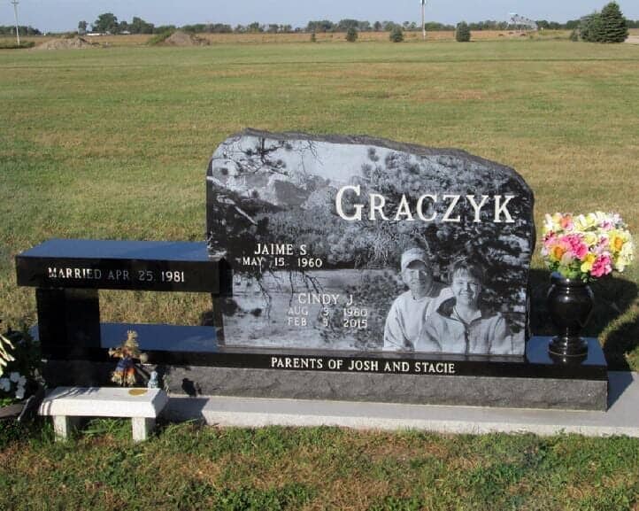 Companion bench/monument memorial with etched portrait in black granite with matching vase