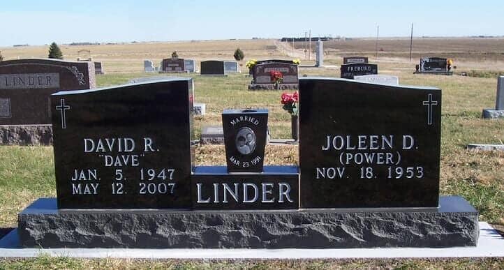 Companion wing monument in black granite with tapered vase and porcelain photo