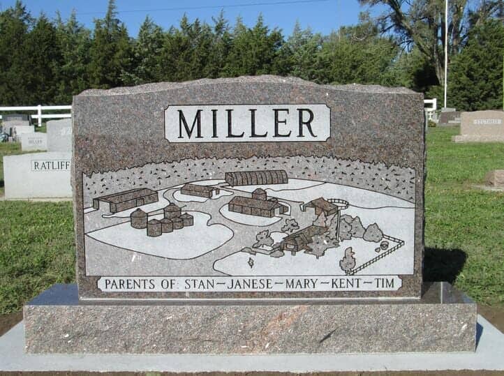 Companion monument in mahogany with sandblasted farm scene on back