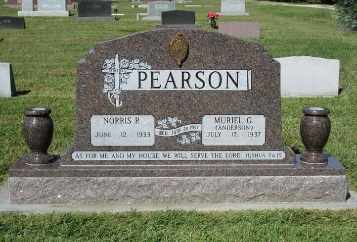 Companion monument in mahogany granite with covered photo frame and turned vases