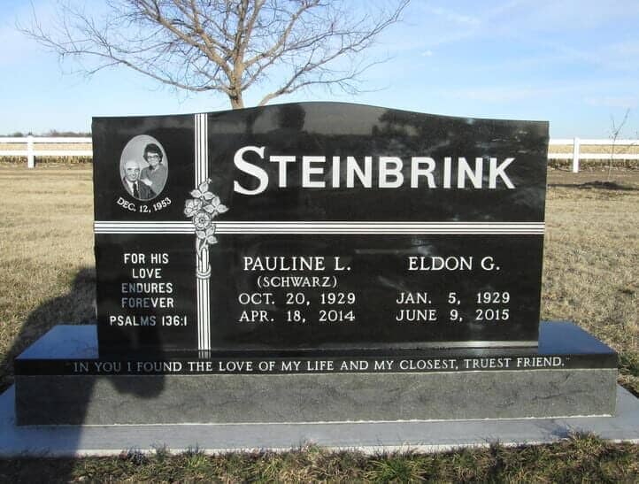 Companion monument in black granite with etched portrait