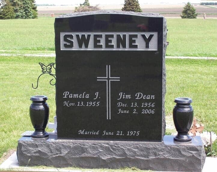 Companion monument in black granite with matching turned vases