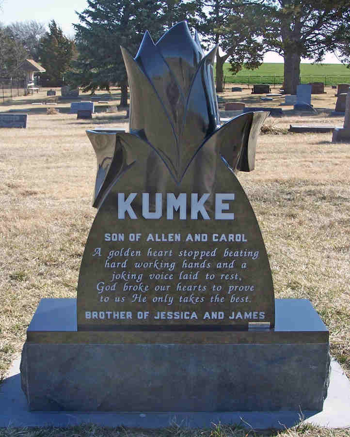 Polished black granite monument