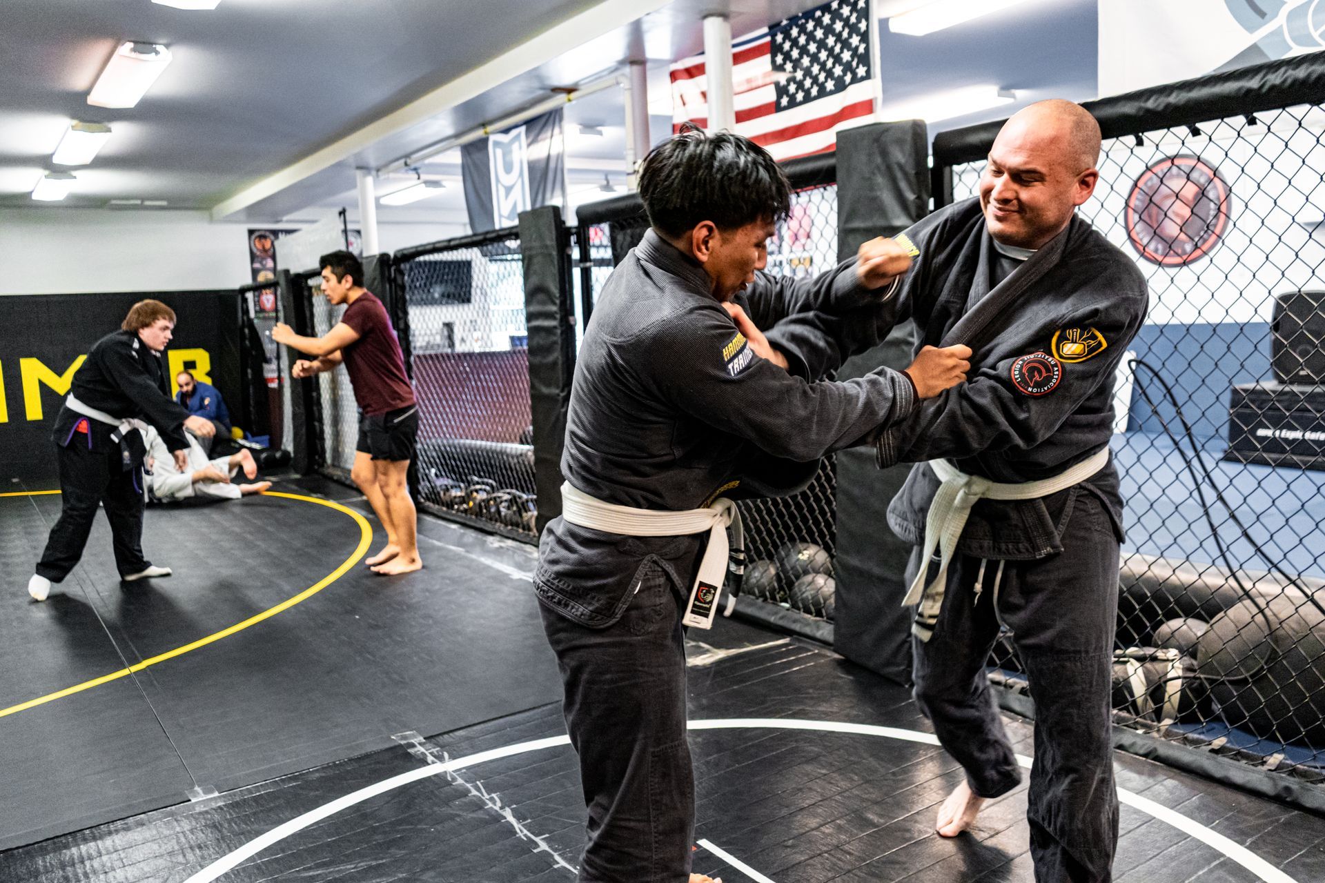 Adults practicing Jiu-Jitsu drills at Hammer Sports and Performance in Hazlet, NJ, building fitness 