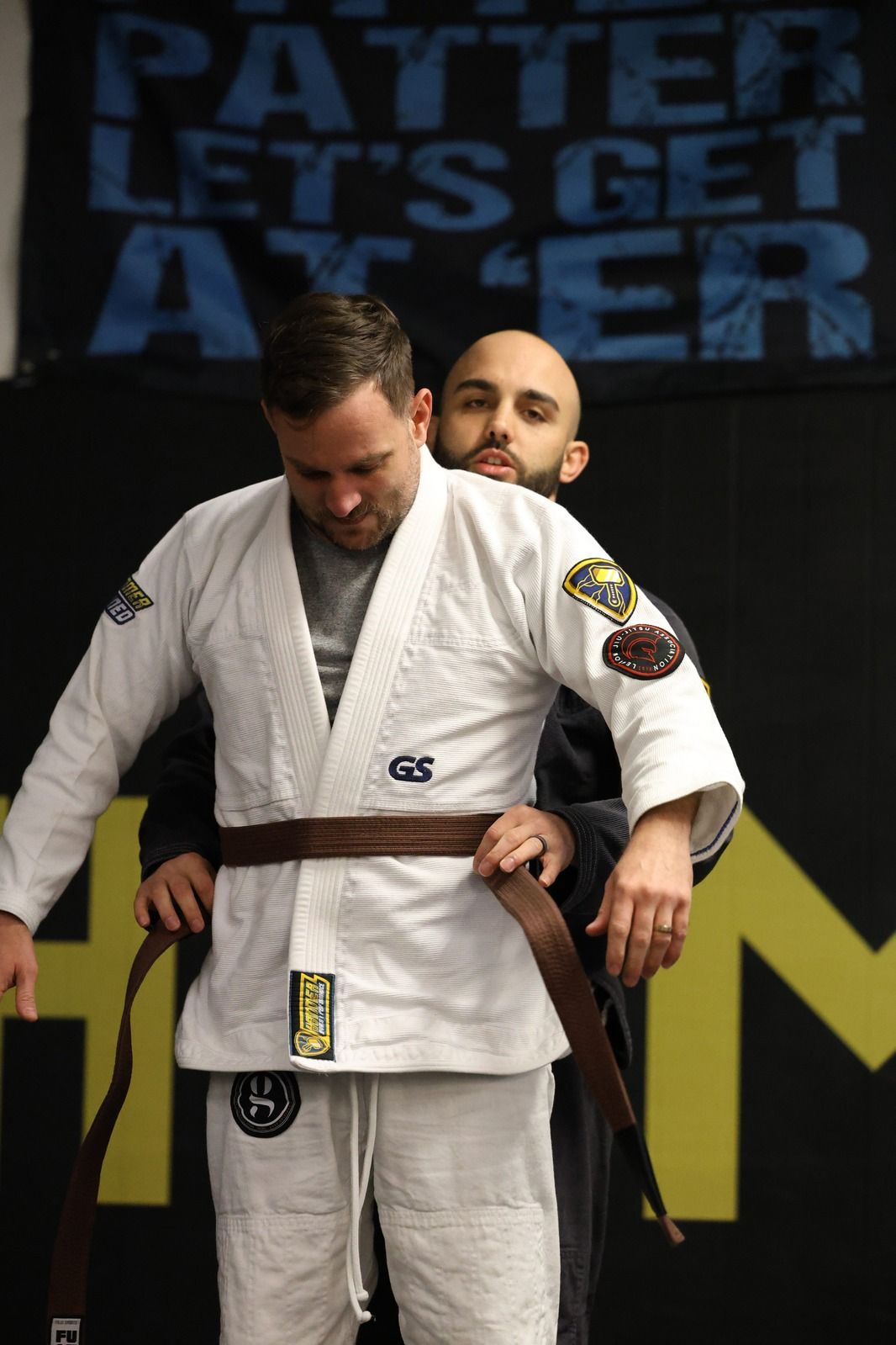Adults training Brazilian Jiu-Jitsu at Hammer Sports and Performance in Hazlet, NJ for stress relief and focus.