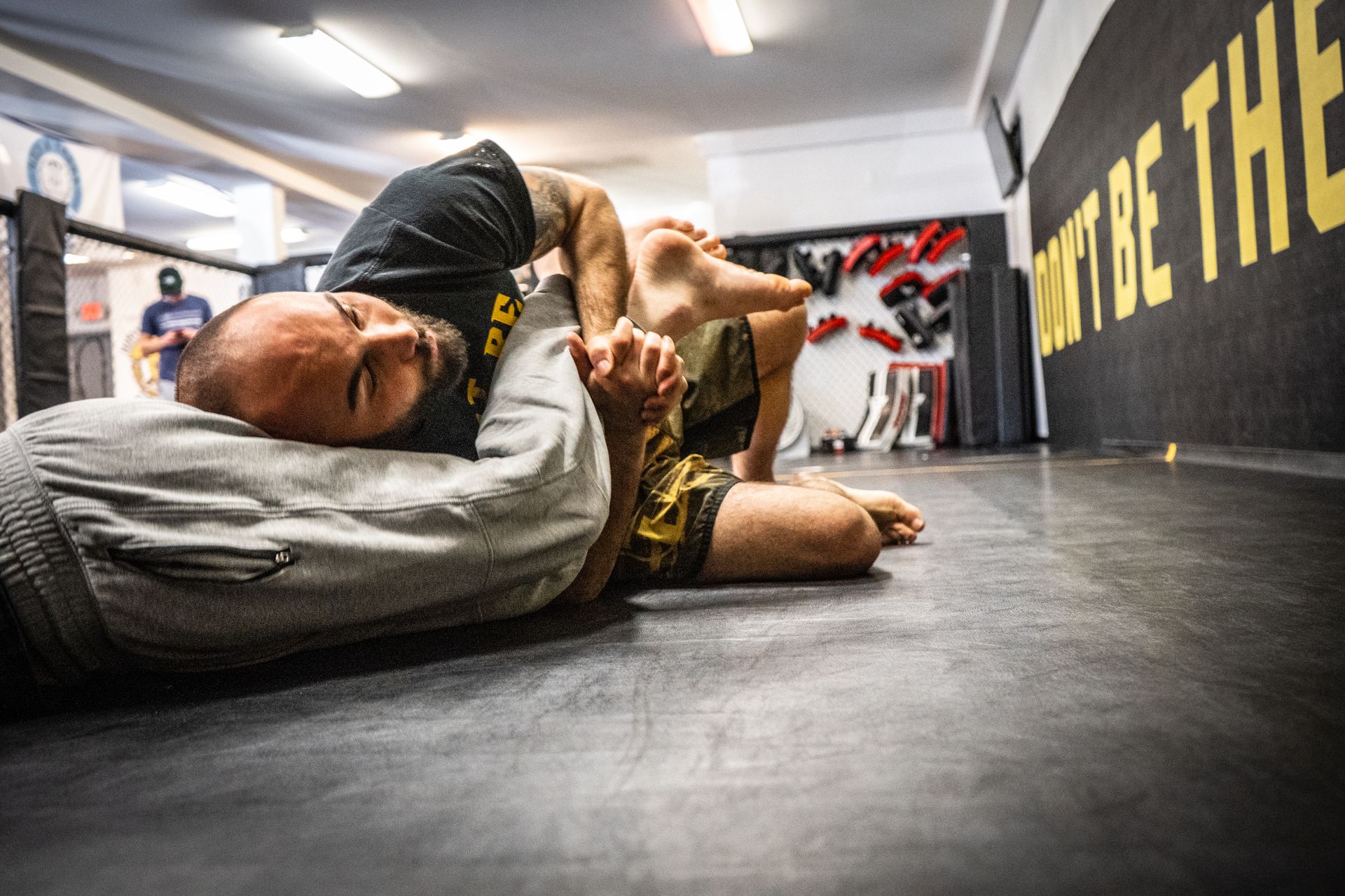 Instructor teaching safe Brazilian Jiu-Jitsu techniques to prevent injuries at Hammer Sports and Performance in Hazlet NJ.
