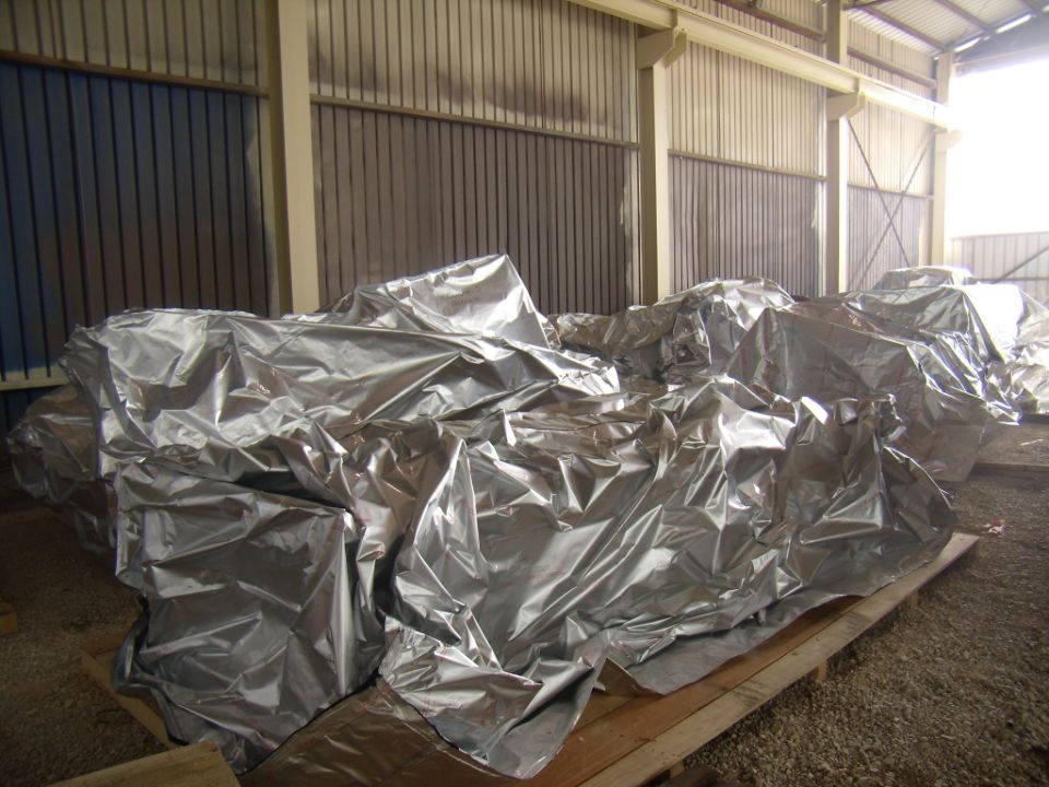 imballaggi in legno con teli argentati