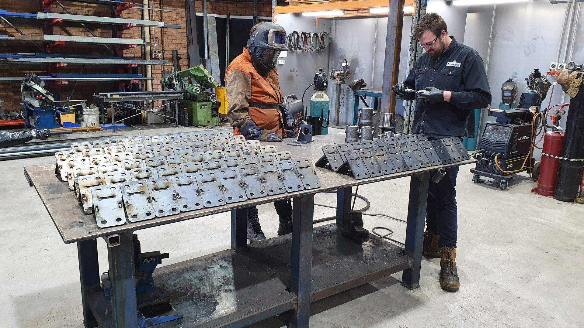 A Machine Is Cutting A Piece Of Metal On A Lathe — Real Engineering In West Gosford, NSW