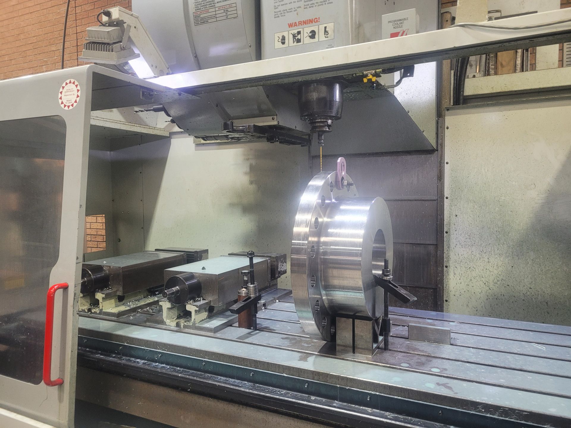 a Man is Welding a Piece of Metal With a Welding Machine — Real Engineering In West Gosford, NSW