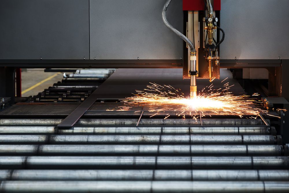 Laser Cutter Emitting Sparks — Real Engineering in Sydney, NSW