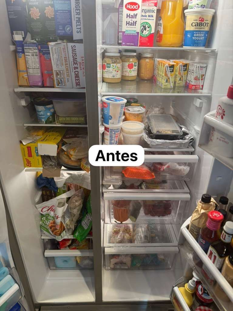 Refrigerator interior before organization, with various food items on shelves and in drawers.