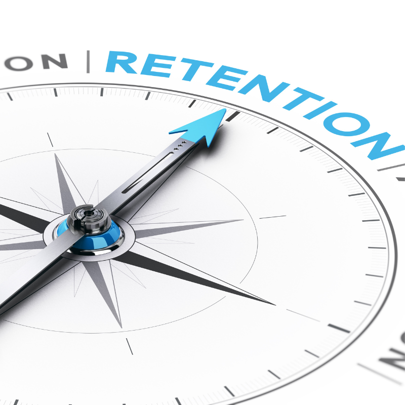 a compass with a blue arrow pointing to the word retention